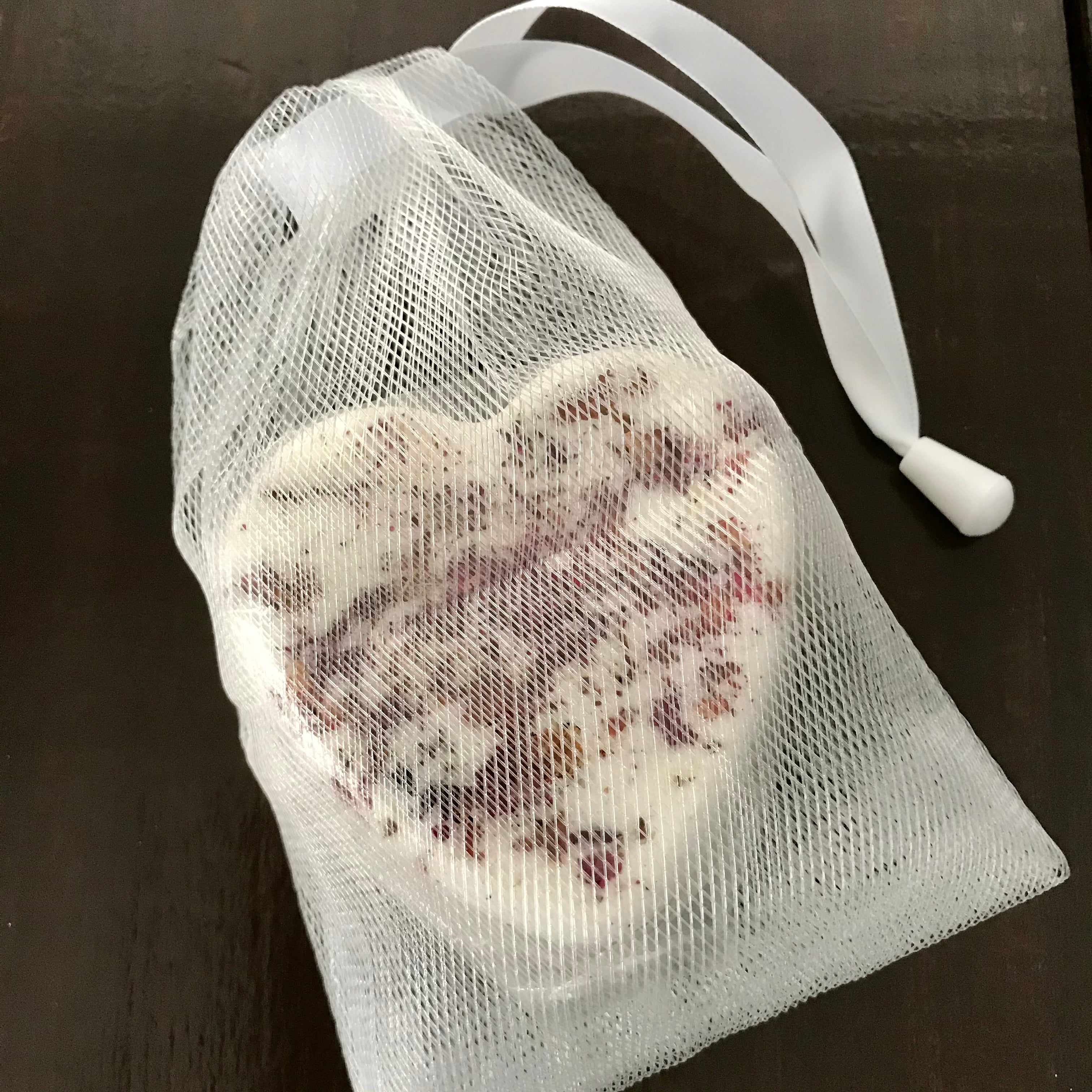 natural essential oil bath bomb in mesh bag