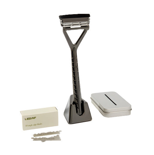 Leaf Razor Kit in Mercury finish with pivoting metal razor, matching stand, 50 single-edge blades, and blade recycling tin – plastic-free shaving set