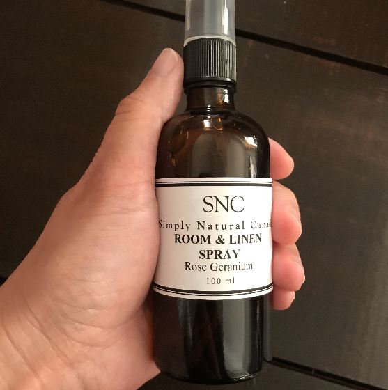 natural rose geranium essential oil room and linen in a 100 ml amber glass bottle with black spray top made in canada by simply natural canada