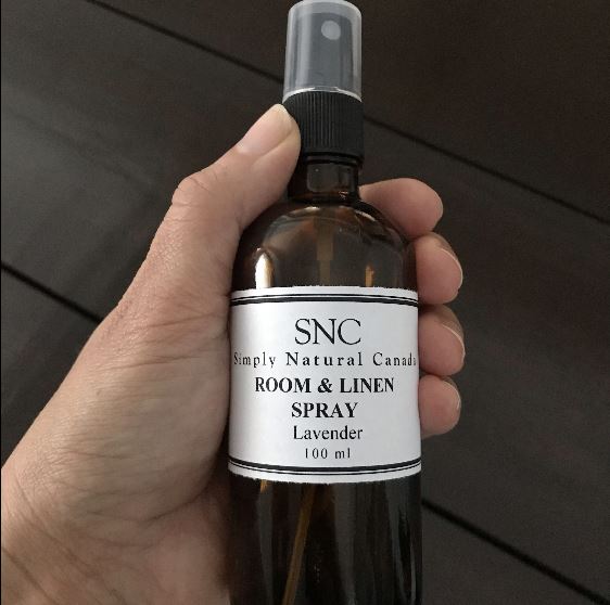 natural lavender essential oil room and linen in a 100 ml amber glass bottle with black spray top made in canada by simply natural canada