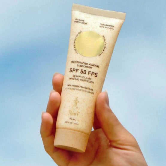 Moisturizing SPF 50 mineral sunscreen from Tanit Botanics in a 90 ml compostable tube is made in Canada with mineral filters, precious organic oils and natural butters to protect and moisturize the skin safely, without any harm to marine life 