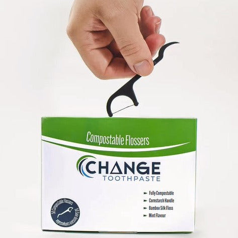 Set of 50 compostable flosser picks in a box made in canada by Change Toothpaste