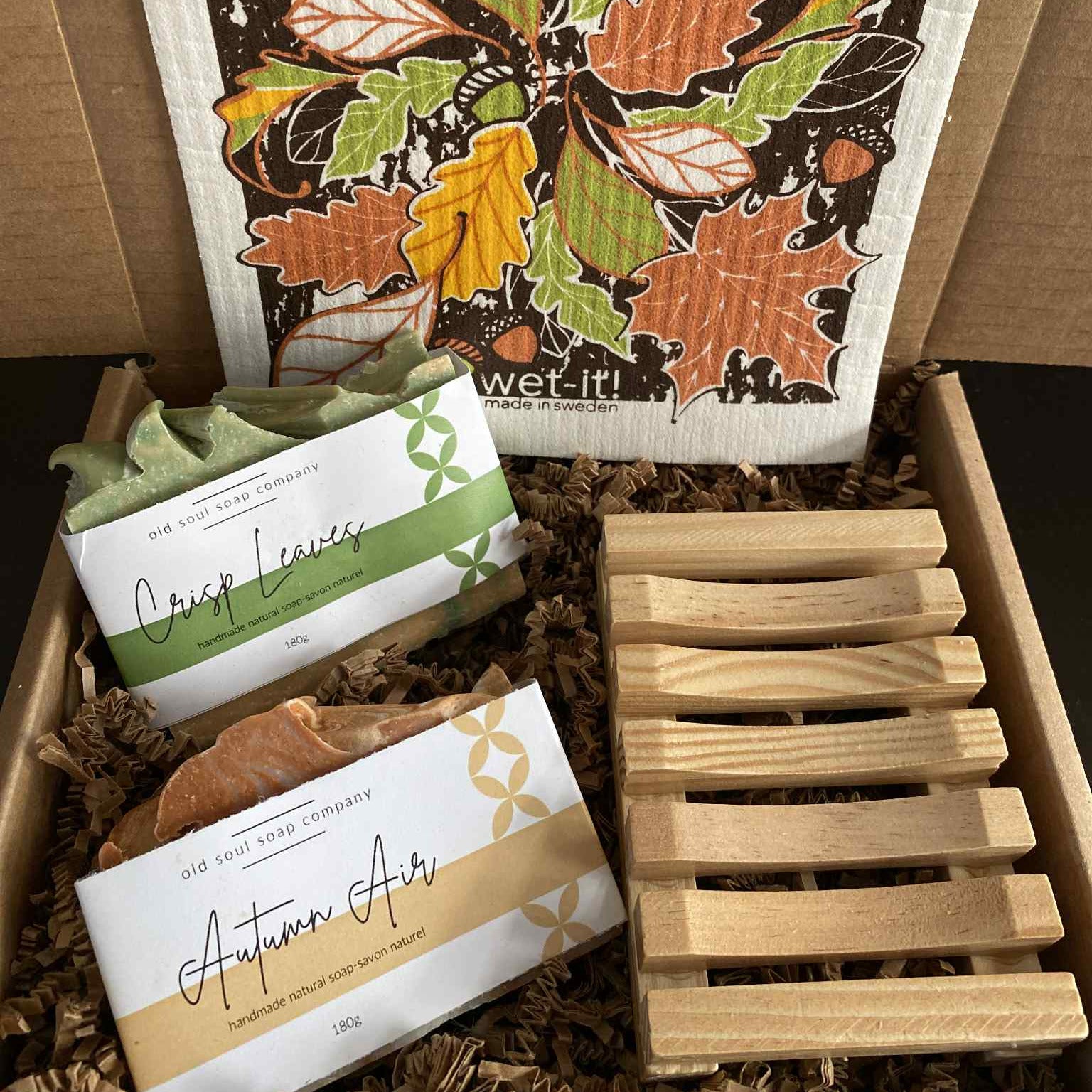 Autumn Leaves soap bars in a white eco gift box with kraft paper accents, featuring leaf-shaped designs and textured soap