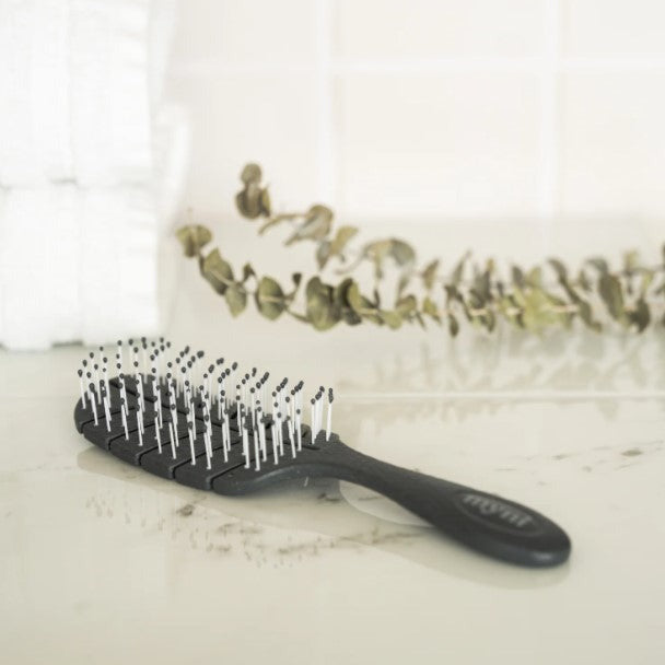 Black Myni Wheat Straw Hair Brush is perfect to use in the shower if you want to brush your hair while conditioning it.