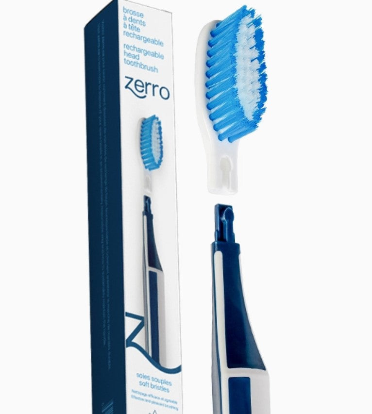 Zerro Replaceable Head Toothbrush in blue with soft bristles and reusable handle, Canadian-made eco-friendly toothbrush shown with packaging and snap-on replacement head.
