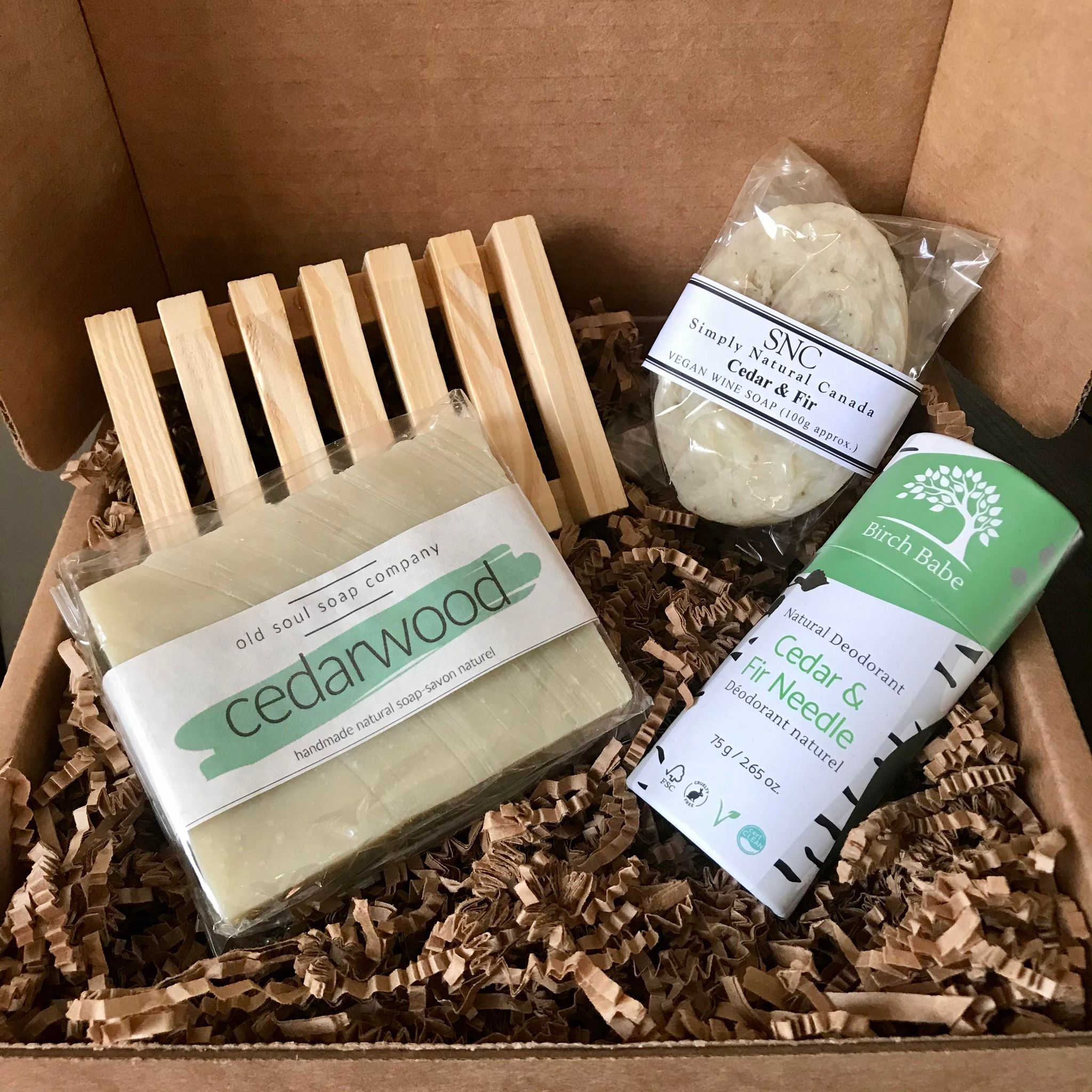 Included in this gift box is a cedarwood vegan soap from the Old Soul Soap Company, a wooden soap dish, a cedar & fir vegan wine soap from Simply Natural Canada and a cedar & fir vegan deodorant from Birch Babe.