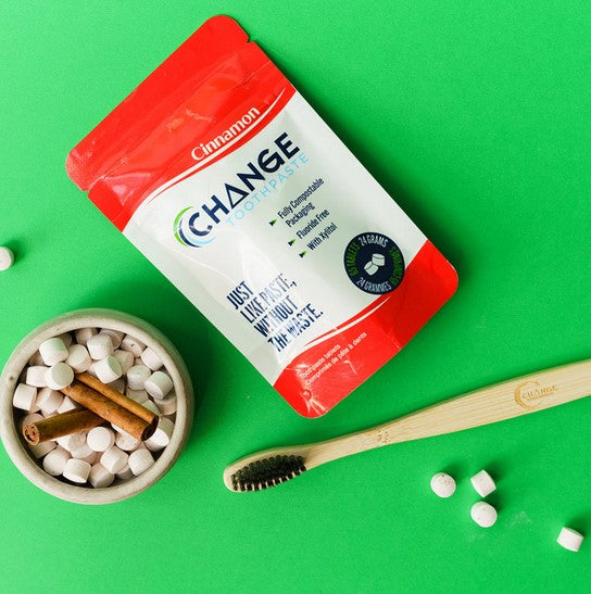 Change Toothpaste tablets in a cinnamon flavour are an earth-friendly way to care for your teeth. These Canadian-made tablets are just like regular toothpaste but without the waste. They come packaged in either a compostable 1 or 3 month tablet pouch, a sample size or in an aluminum travel tin.  