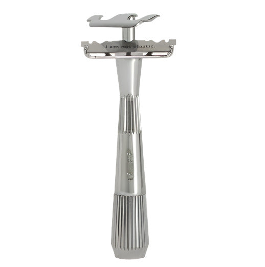 Leaf Shave Thorn Razor in Chrome with open single-edge blade and engraved "I am not plastic" message