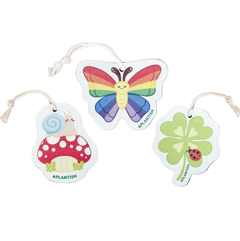 Plantish Dewdrop Dwellers Pop-Up Sponges Set of 3 – eco-friendly cellulose sponges with playful spring designs featuring a snail on a mushroom, rainbow butterfly, and clover with ladybug