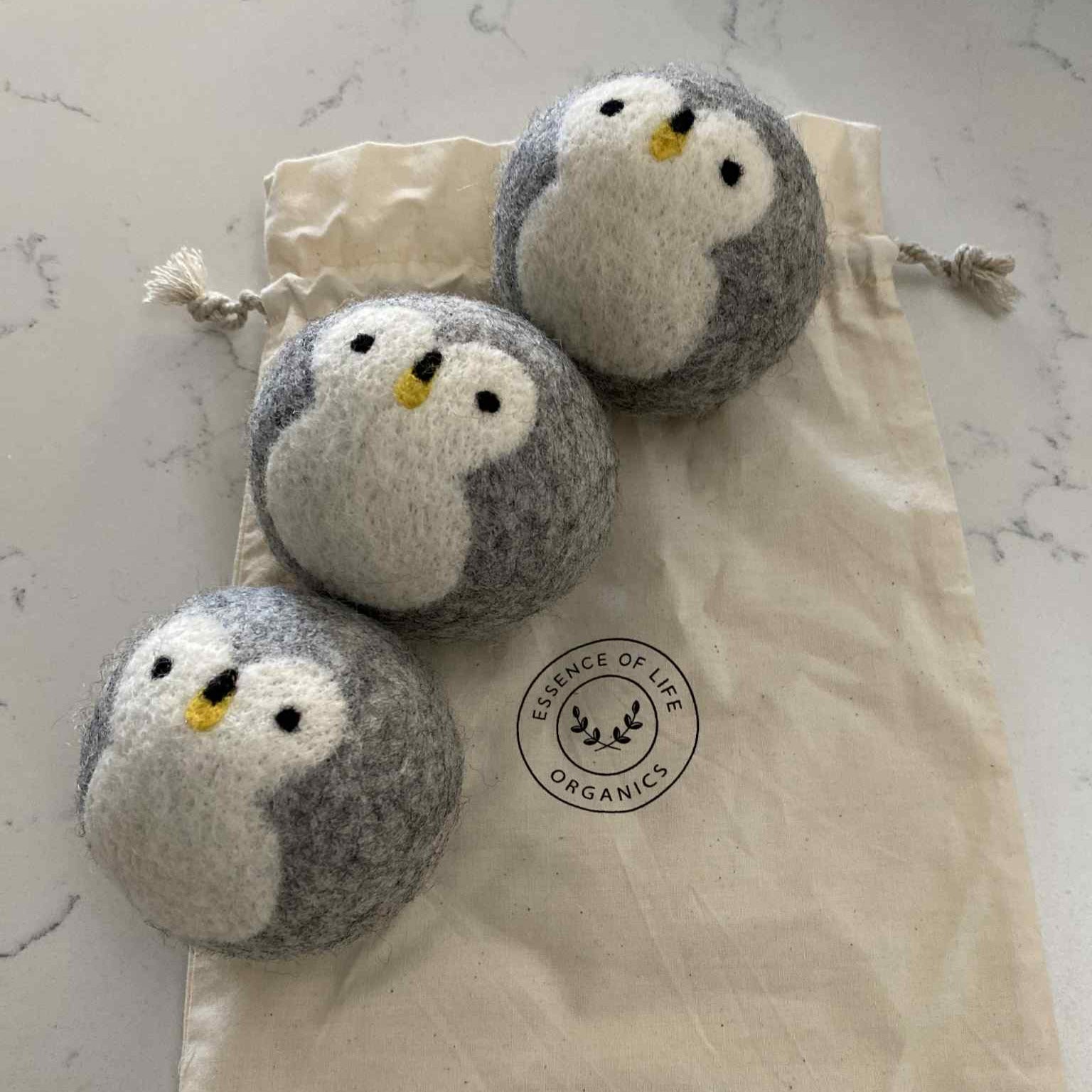 Hand-felted penguin wool dryer balls by Essence of Life | sustainable and reusable fabric softener alternative