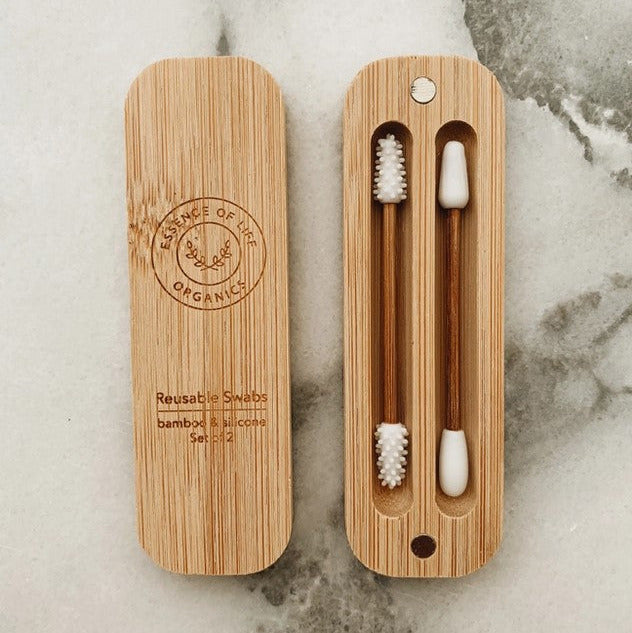 Close-up of bamboo tips and silicone tips showing textured surfaces for gentle cleaning in reusable silicone and bamboo