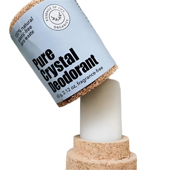 This 100% natural plastic-free zero waste Pure Crystal Deodorant by Essence of Life Organics is pictured on a white background with the lid off to show the crystal sitting in it's cork base. 