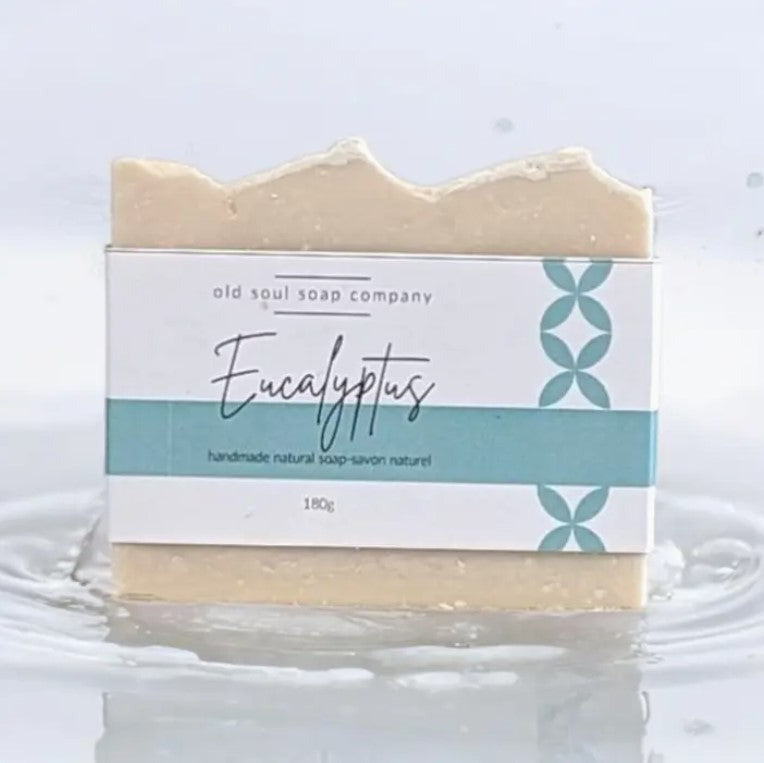 Handcrafted vegan eucalyptus soap made in Canada by the Old Soul Soap Company on a white watery background.