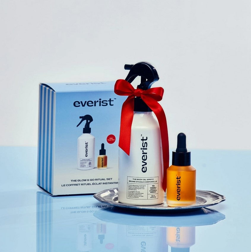 Close-up of the Everist Go & Glow Ritual Set’s textured glass jar with metallic lid and engraved logo detail