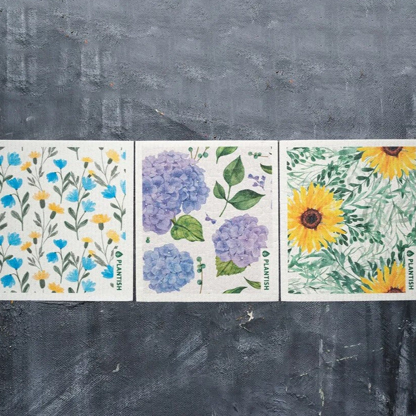 Kitchen cleaning can be fun and easy with this Plantish Swedish dishcloth set of 3 featuring one of each - hydrangea, aster and sunflower patterns. This plant-based sponge cloth can absorb up to 3/4 of a cup of liquids, it's perfect to clean up water and tea spills, dry dishes and pots, as well as wipe countertops and other surfaces.