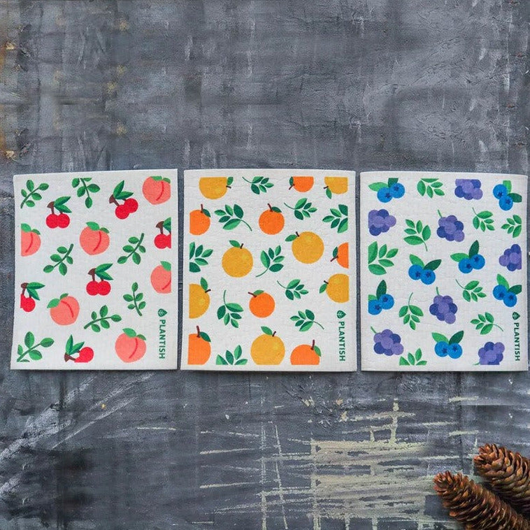 Kitchen cleaning can be colourful, fun and easy with this Plantish Swedish dishcloth set of 3 featuring one of each - a peach, orange and blueberry motifs. These sponge cloths easily soak up water and tea spills, dry dishes and pots, as well as wipe countertops and other surfaces.