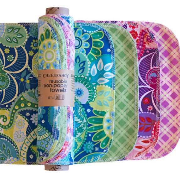 Set of 8 colourful reusable paper towel rolls made by cheeks ahoy on a white back ground