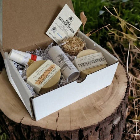 This Happy Camper essentials kit from the Old Soul Soap Company is everything the outdoor enthusiast needs from soap and shampoo to outdoor, after bite balm and a firestarter puck. 
