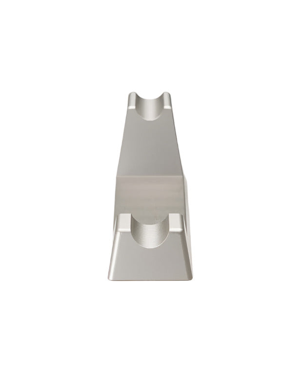 Top-down narrow view of aluminum Henson Razor Stand with grooved cradle