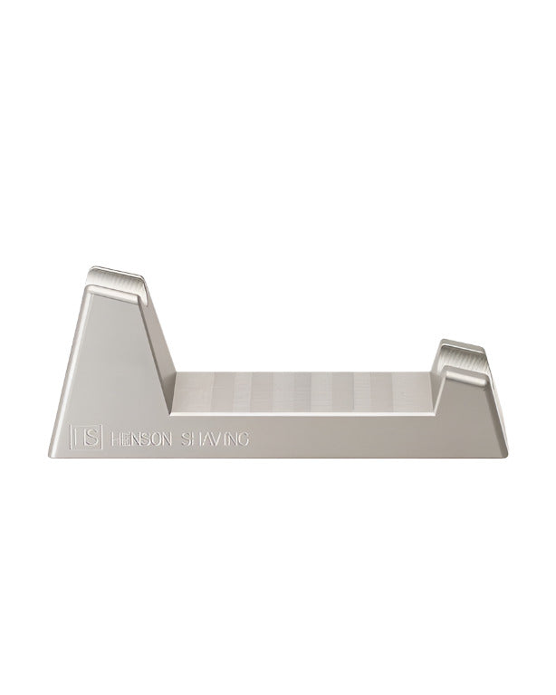 Brushed aluminum Henson Razor Stand shown from front with logo engraving