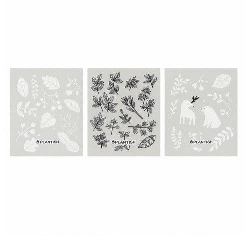 Into the Woods Swedish Sponge Cloth Set of 3 by Plantish – grey eco-friendly dishcloths featuring First Frost, Herbal Remedy, and Deer Bear wildcrafting designs on a white background.