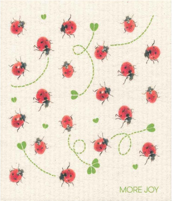Compostable eco sponge cloth made of cellulose and featuring a delightful collection of lady bugs on the move against a white background replaces paper towel by absorbing 20x its weight in liquid. Size 20 x 17 cm