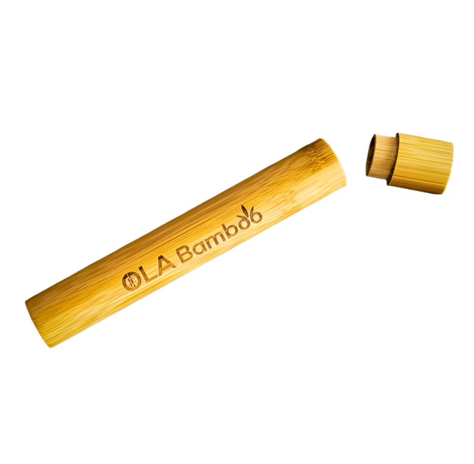 Ola Bamboo Toothbrush Travel Case made of natural bamboo on dark stone background
