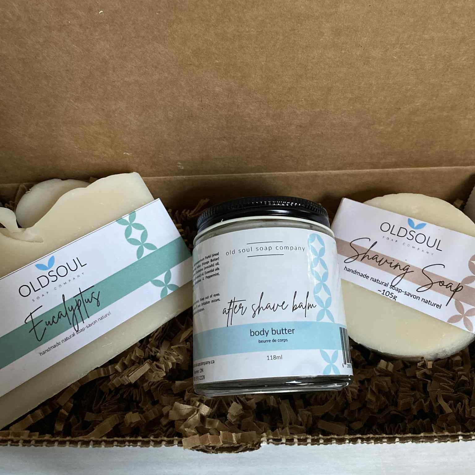 Eucalyptus Shave Gift Set featuring three Canadian-made products by the Old Soul Soap Company — a eucalyptus body bar, after shave balm, and natural shaving soap, packaged in a cardboard box