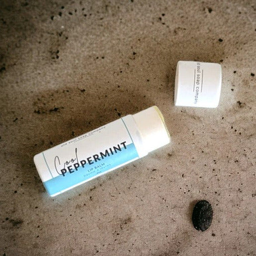 This Peppermint Lip Balm by the Old Soul Soap Company is Canadian made and naturally flavoured. It features a long lasting blend of oils and butters infused with calendula and chamomile in a push up cardboard tube.
