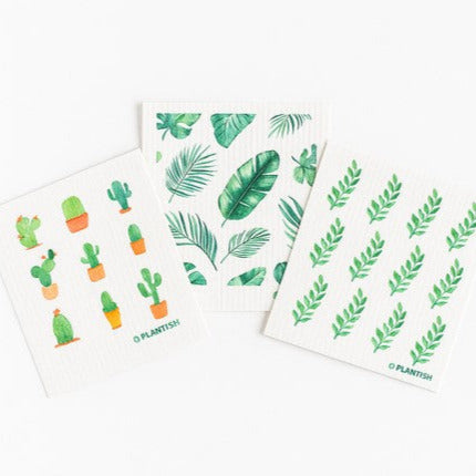 Potting Around Swedish Sponge Cloth Set by Plantish – eco-friendly compostable dishcloths featuring cactus, tropical leaf, and greenery plant designs on a white background.
