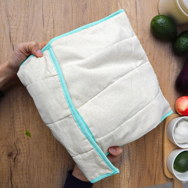 This Produce Saver Bag by Plantish is 42 cm x 52 cm (with flap open) and is made from all-natural, unseeded, and unbleached cotton designed to pull away excess moisture while keeping produce hydrated and free from toxic chemicals. This eco-friendly solution helps extend the freshness of your fruits and veggies for up to 14 extra days and is pictured in the closed position.