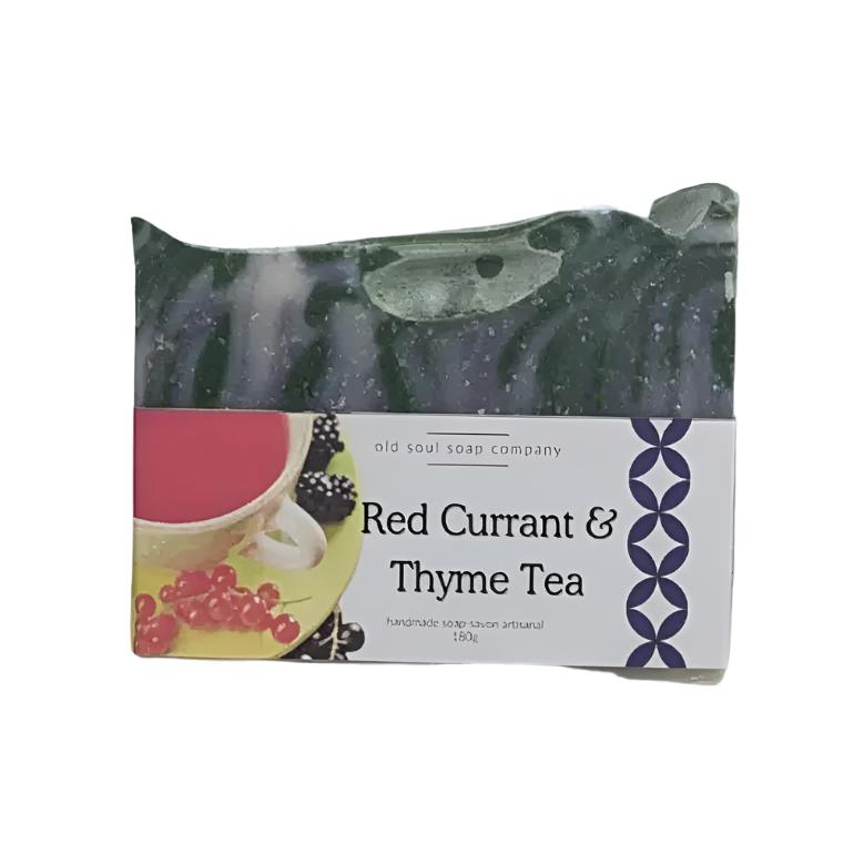 artisan top handcrafted 180 g bar soap with dark marble patterning a photo label featuring a cup of tea and some red currants along with the words Red Currant & Thyme Tea. The soap is on a white background