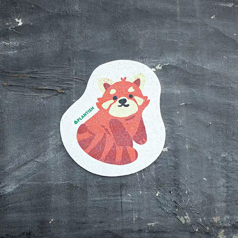 Expandable and compostable red panda Plantish pop up sponge 
