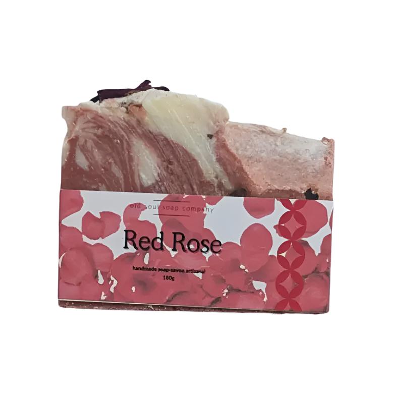 white and pink artisan top handcrafted 180 g bar soap with dried rose petals on the top has a photo label featuring red rose petals and the words Red Rose. The soap is on a white background.