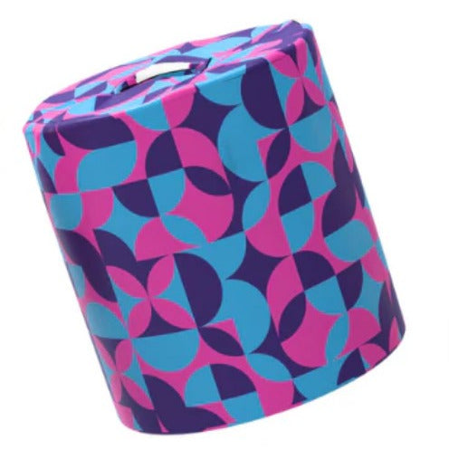Bright purple, pink, and blue geometric wrapped bamboo toilet paper roll – zero waste, eco-friendly bathroom essential.
