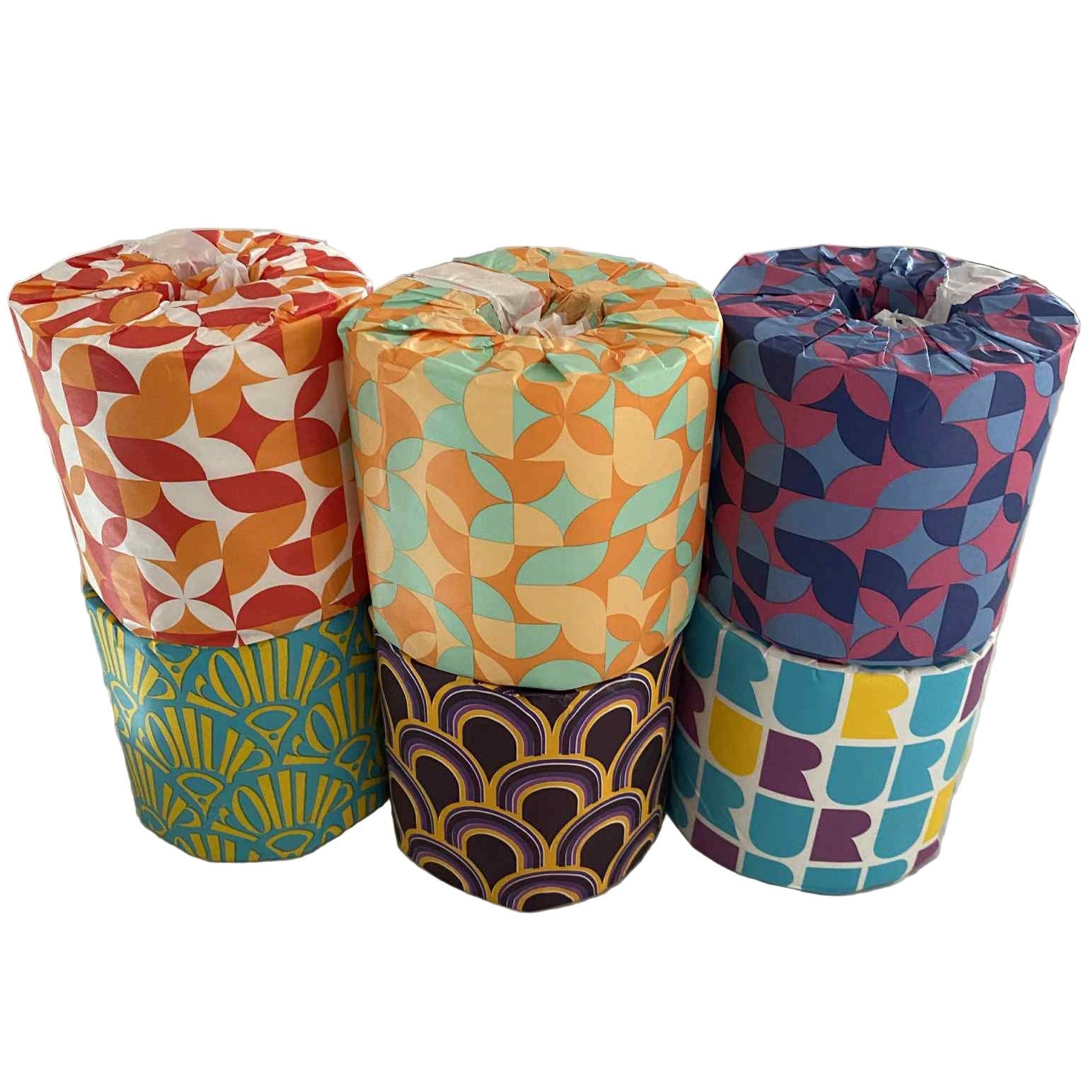 Six bamboo toilet paper rolls by Roll Up, eco-friendly, plastic-free, tree-free bathroom tissue with fun geometric wrap designs.