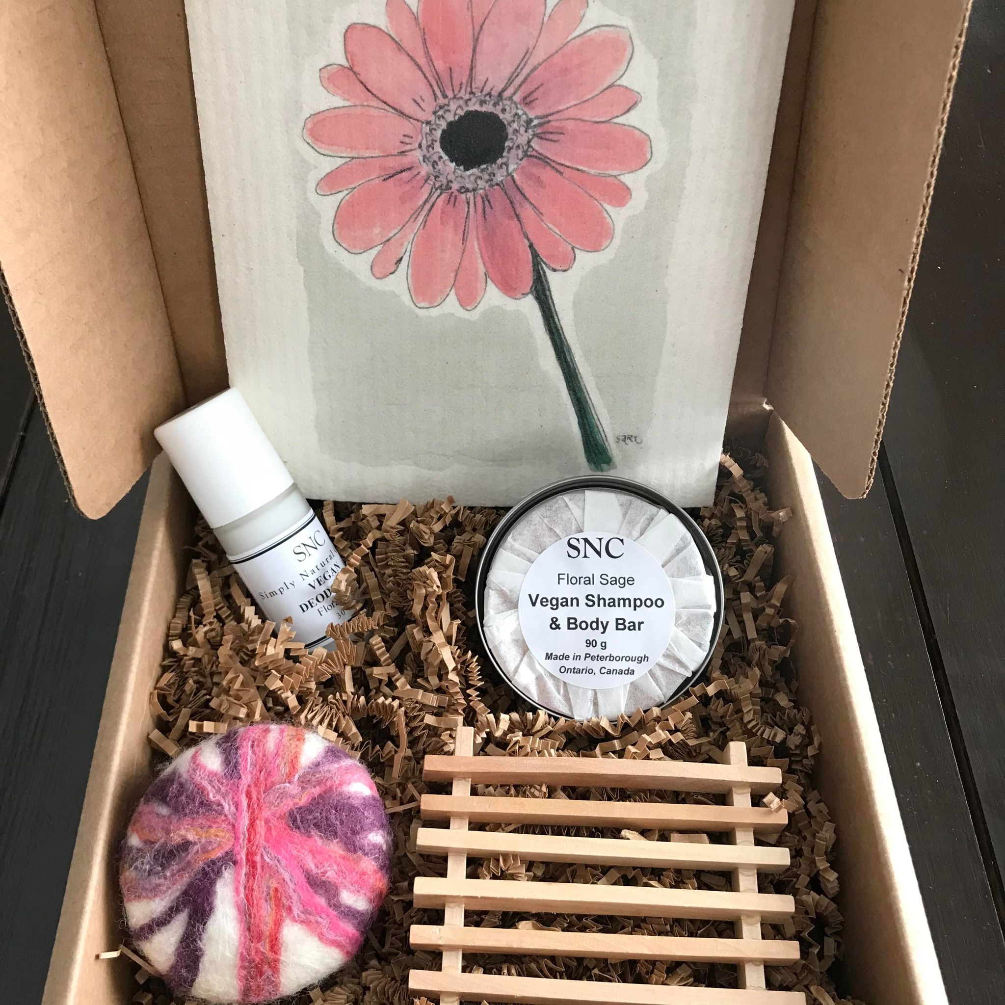 Canadian made Simply Natural Canada handcrafted floral sage essential oil felted soap shampoo bar and natural deodorant gift set with More Joy Swedish sponge cloth in a pink gerbera daisy pattern