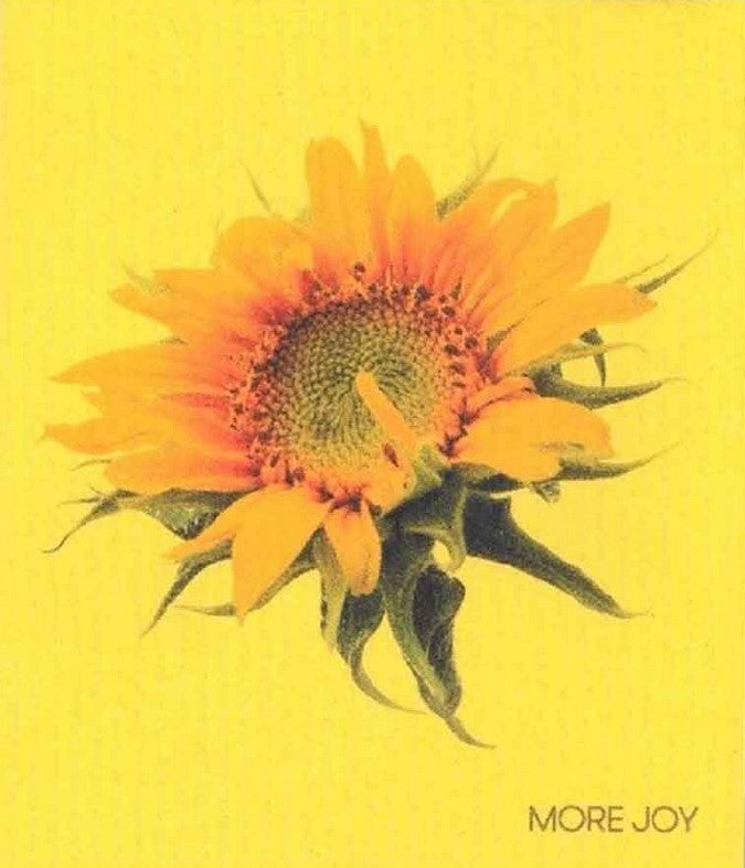 Compostable eco sponge cloth made of cellulose and featuring a sunflower bloom in deep yellow against an off-yellow background, replaces paper towel by absorbing 20x its weight in liquid. Size 20 x 17 cm