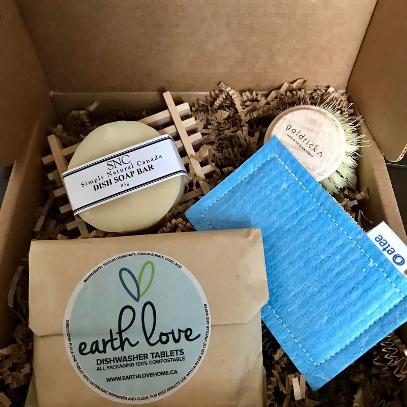 Looking to go more earth-friendly in your kitchen? This zero waste kitchen starter set features a 12 pack of Earth Love Dishwasher Tablets, SNC dish soap bar, wooden soap dish, small round dish scrubber and a Loofie kitchen scrubber from etee packed in a gift box. 