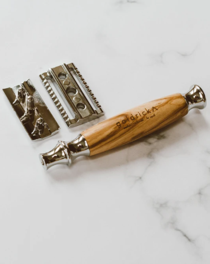 reusable chrome and olive wood razor can be easily be taken apart for cleaning