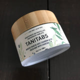 Fresh mint activated charcoal toothpaste tablets in a 45 g glass jar (124 tablets) made in Canada by Tanit