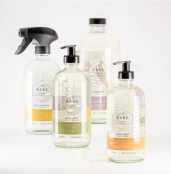 The Bare Home Complete Kit includes four eco-sustainable essential oil scented natural liquid household products made in Canada -  laundry detergent, hand soap, dish soap and all purpose cleaner in refillable glass bottles