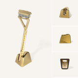 This Gold Leaf Razor Stand is designed by Leaf Shave with features like an embedded rubber foot and a drainage hole