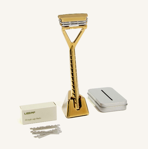 The Leaf Shave 'Gold' Kit includes a pivoting head razor, leaf razor stand, pack of 50 single edge blades and a blade recycling tin