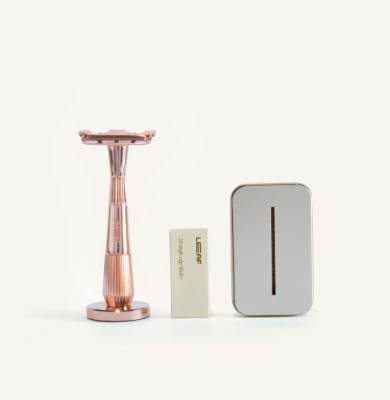 This Leaf Shave starter kit features The Twig razor in rose gold, a box of 50 single-edge blades and a blade recycling tin