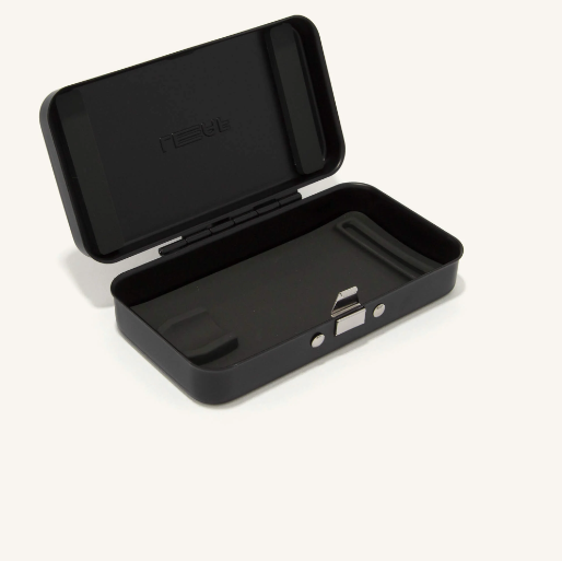 The Twig Case 'black', constructed from aluminum, with a lunch-box hinge, push-button latch, and silicone inserts