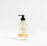 canadian made blood orange, bergamot lime and sandalwood essential oil scented natural hand soap in a 236 ml refillable glass pump bottle made by the bare home company based in ontario
