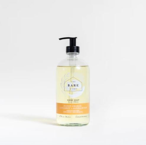 canadian made blood orange, bergamot lime and sandalwood essential oil scented natural hand soap in a 476 ml refillable glass pump bottle made by the bare home company based in ontario