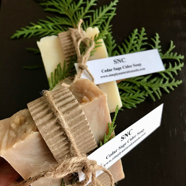 Cedar sage cider soap made in canada by simply natural canada and gift wrapped with a piece of fresh cedar on it