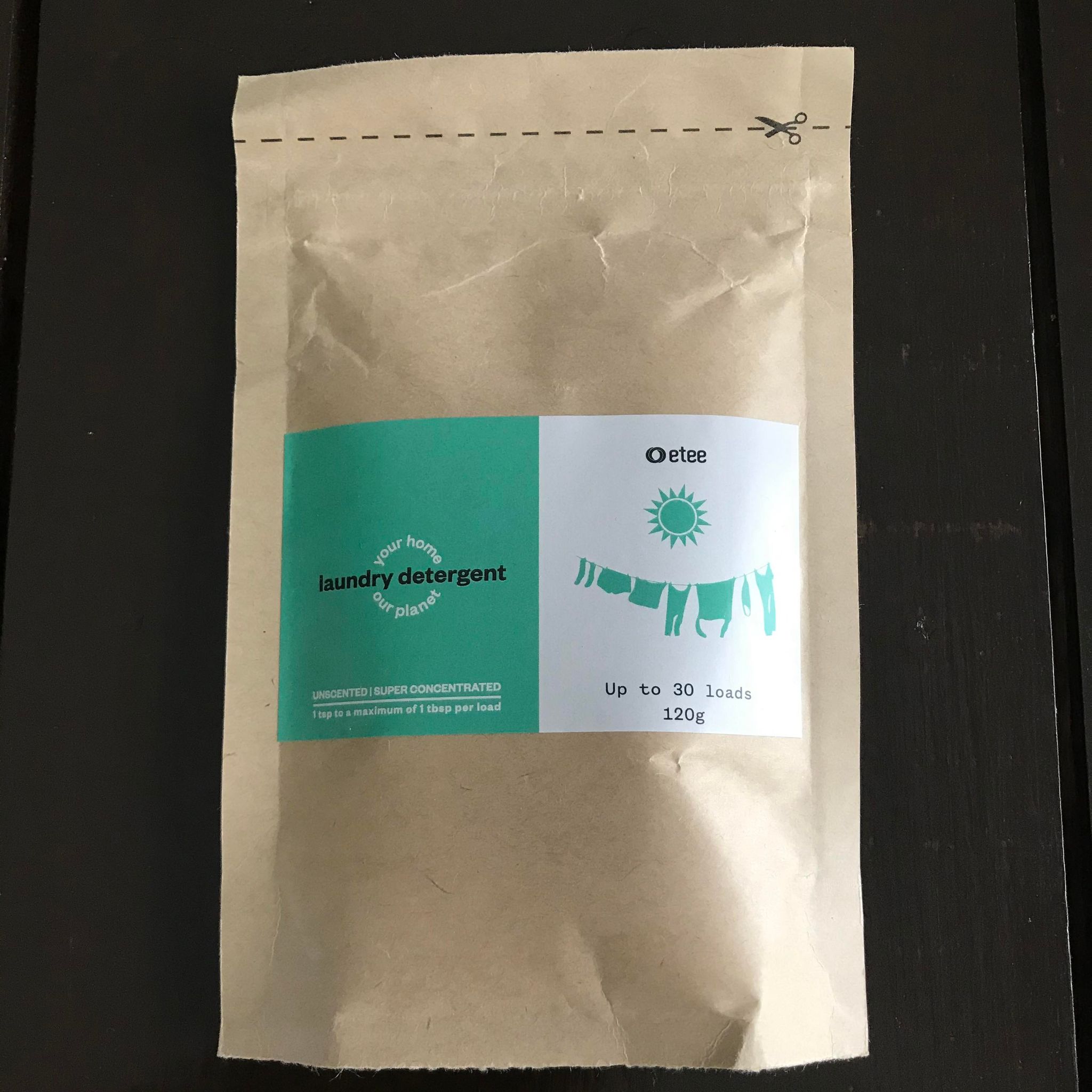 etee unscented soap concentrated laundry powder in a compostable 120 g pouch good for up to 30 loads